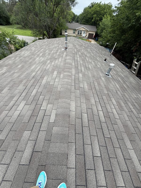 Finished new shingle roof, clean and weather-tight